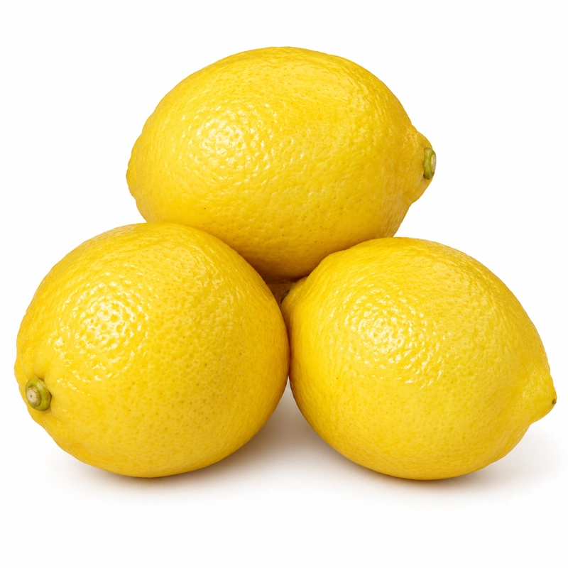 Lemon ùr buidhe air a thaghadh le làimh